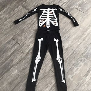Skeleton jammies - size 8